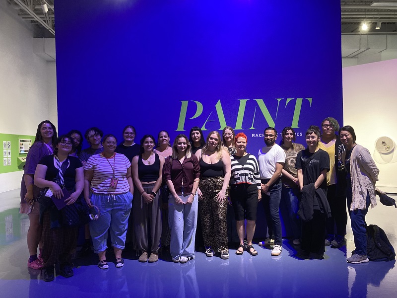 Students at PAINT exhibition